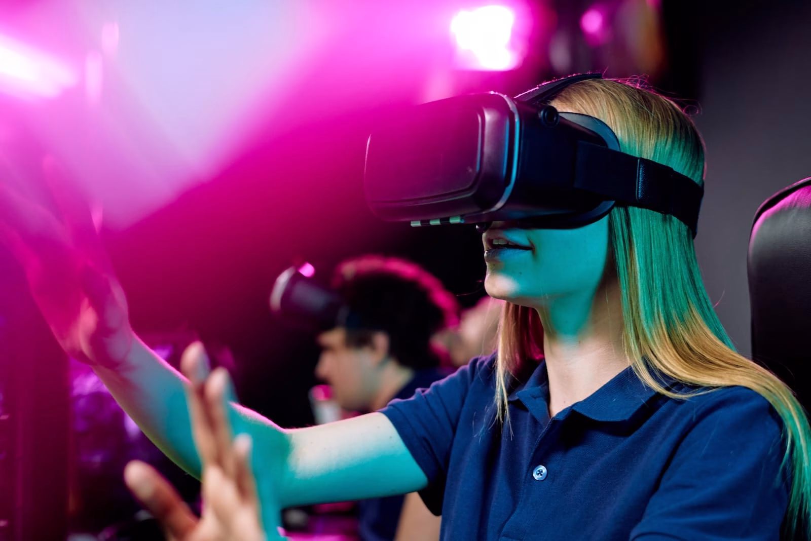 blond-girl-in-vr-goggle-touching-virtual-display-d-2023-11-27-05-25-15-utc